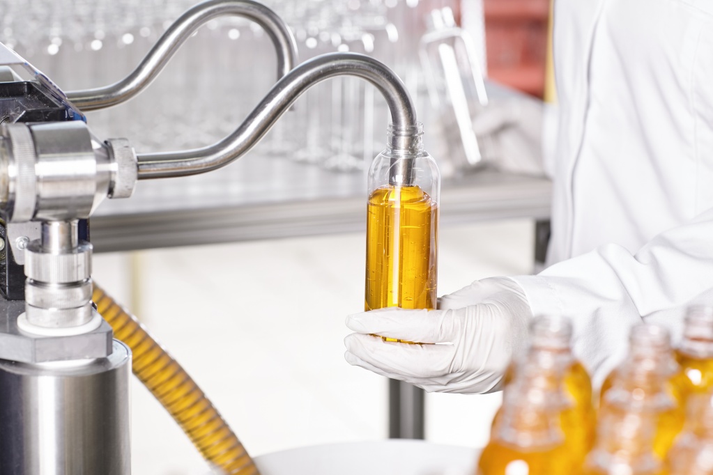 transparent-plastic-bottles-filled-with-yellow-substance (1).jpg